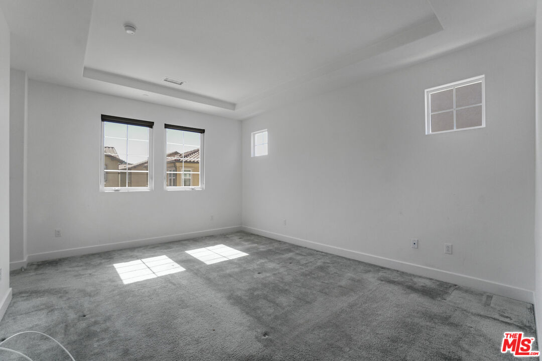 20705 West Chestnut Circle Porter Ranch, CA 91326 - Photo 21 of 35 an empty room with a window