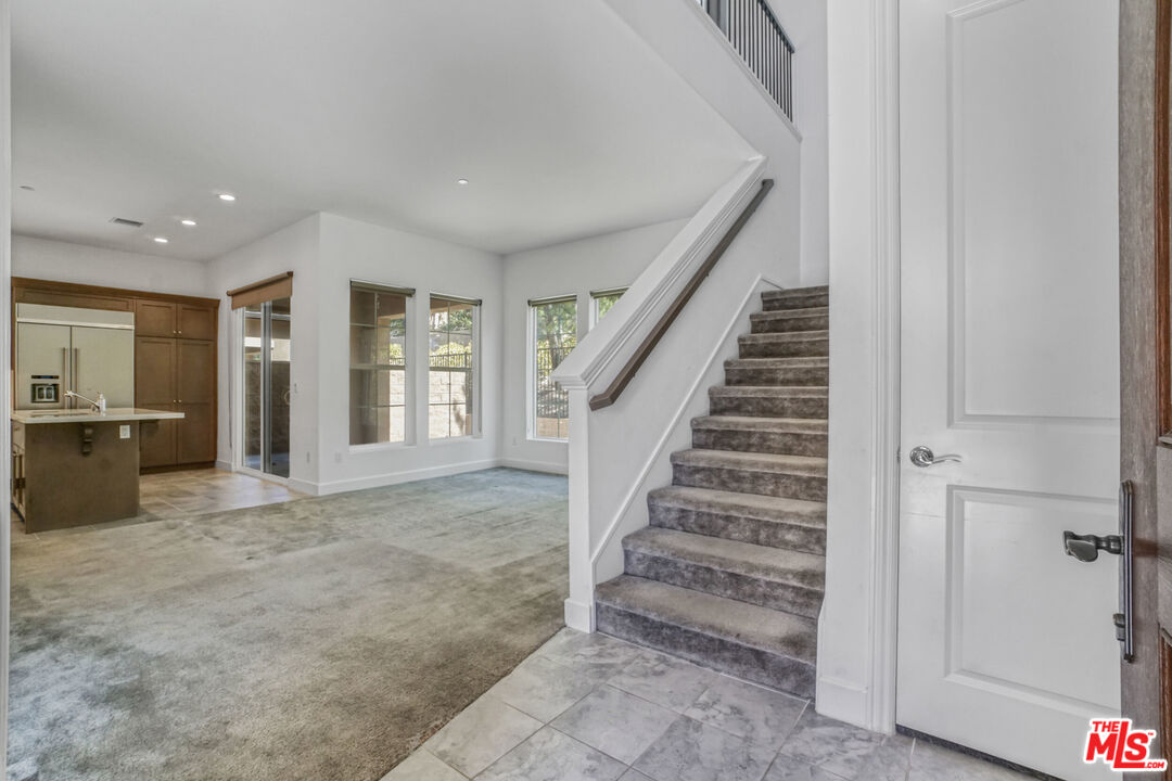 20705 West Chestnut Circle Porter Ranch, CA 91326 - Photo 3 of 35 a view of entryway with livingroom