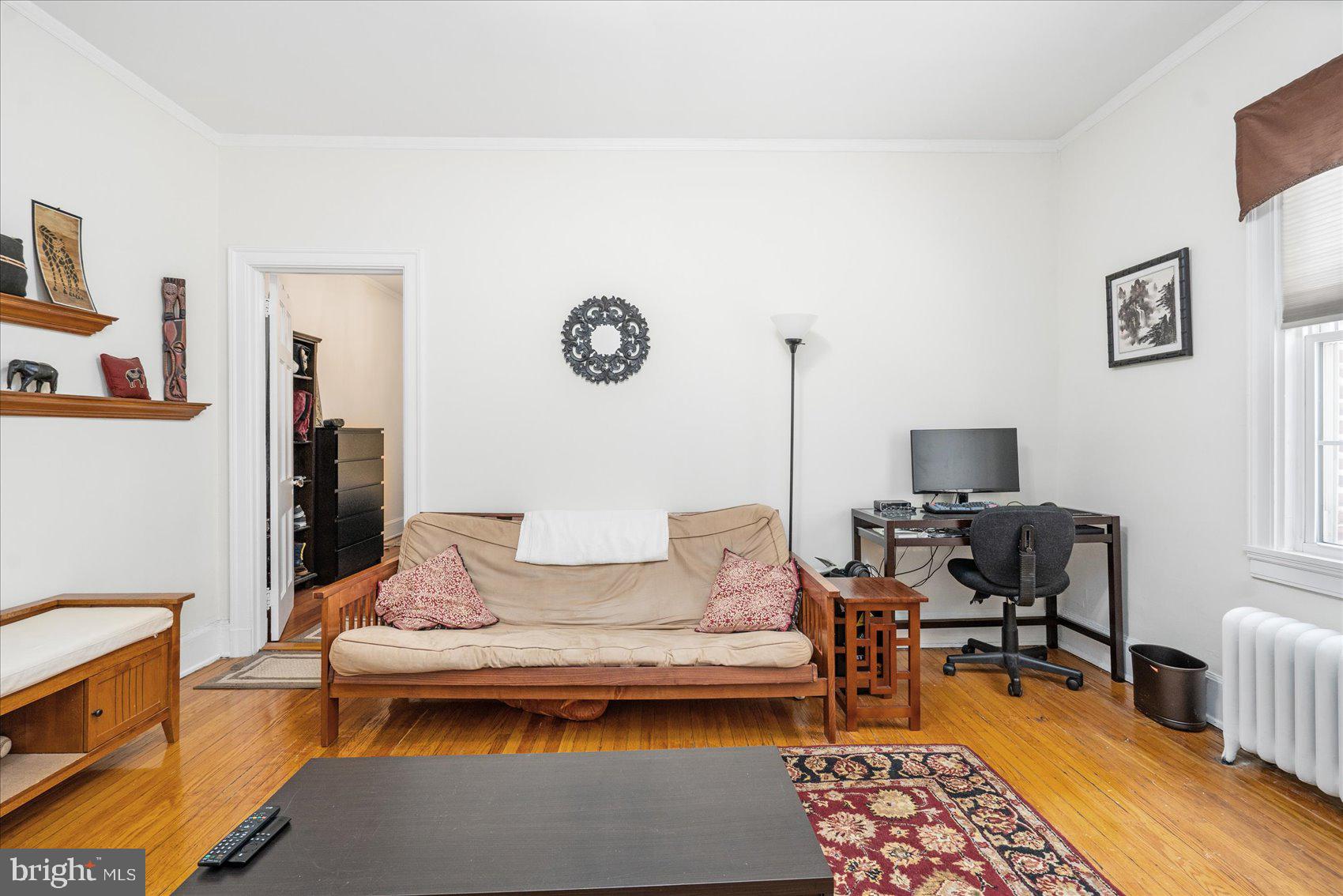 103 West 39th Street, Unit E2 Baltimore, MD 21210 - Photo 12 of 22 View from living room to large bedroom