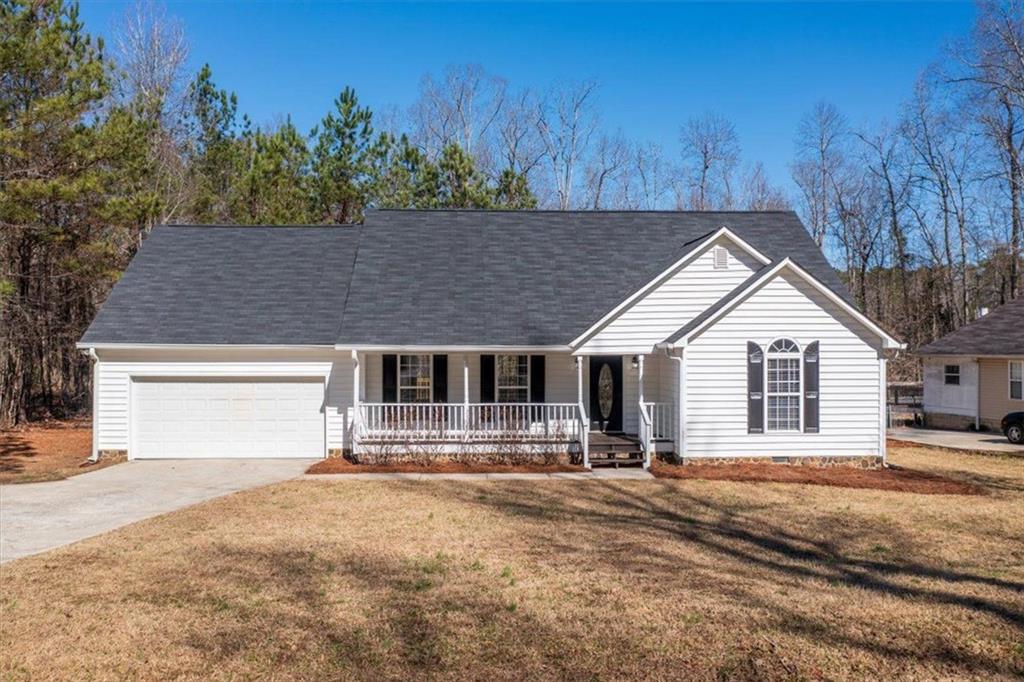 1726 Wilkerson Road Southwest Rome, GA 30165 - Photo 1 of 1 front view of a house with a yard