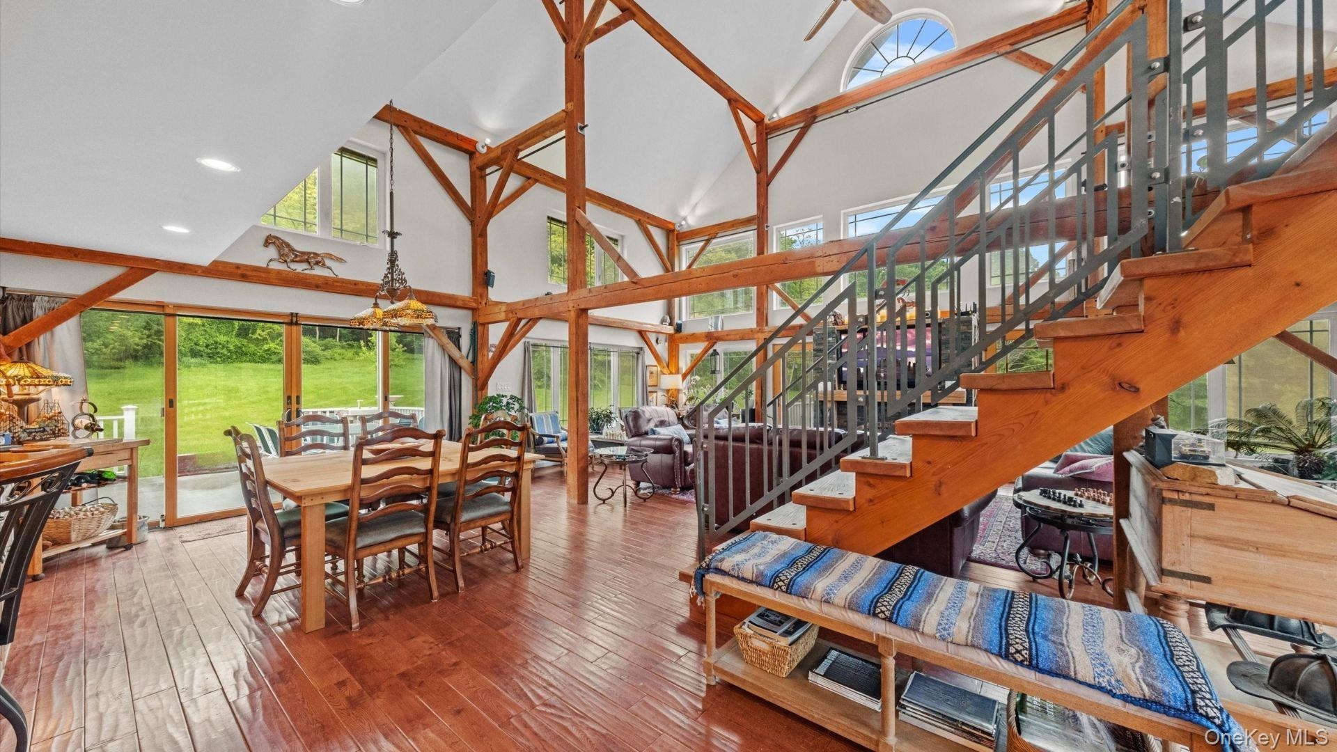 42 Blackstone Ridge Holmes, NY 12531 - Photo 15 of 43 a dining room with furniture entryway and wooden floor