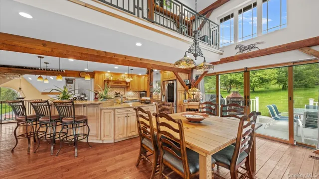 a view of a dining room with furniture window and outside view
