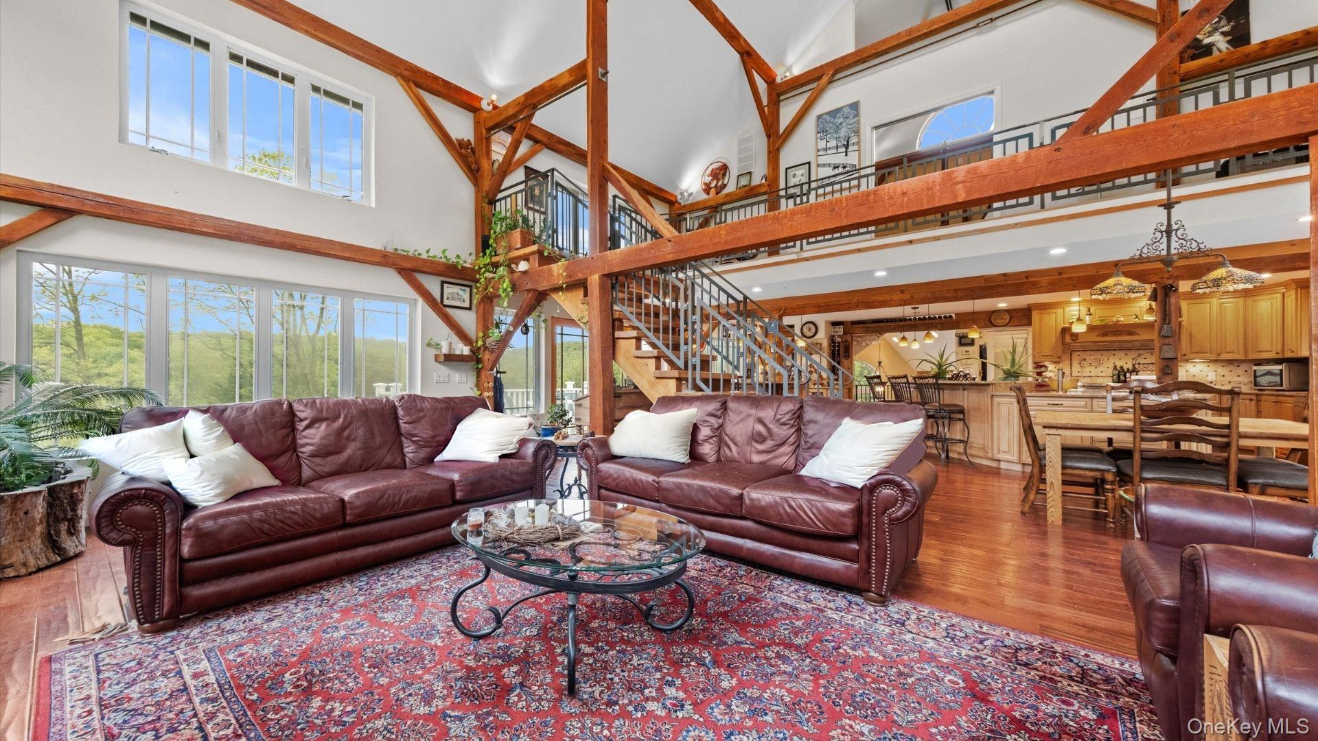 42 Blackstone Ridge Holmes, NY 12531 - Photo 20 of 43 a living room with furniture and a large window