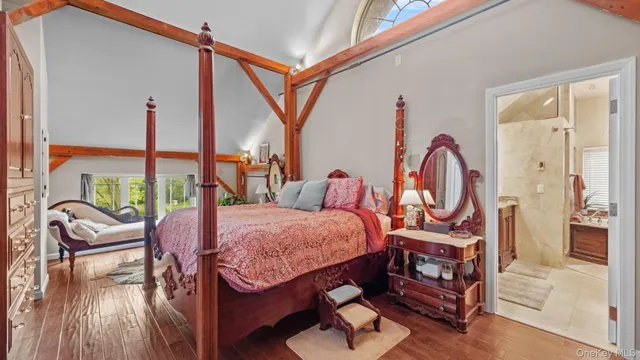 a bed room with furniture and a window