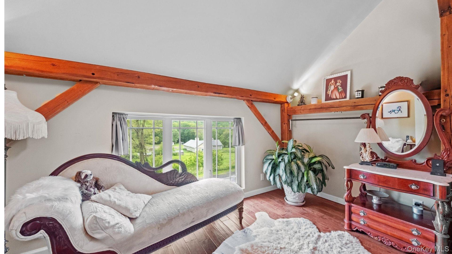 42 Blackstone Ridge Holmes, NY 12531 - Photo 26 of 43 a living room with furniture a rug and a window
