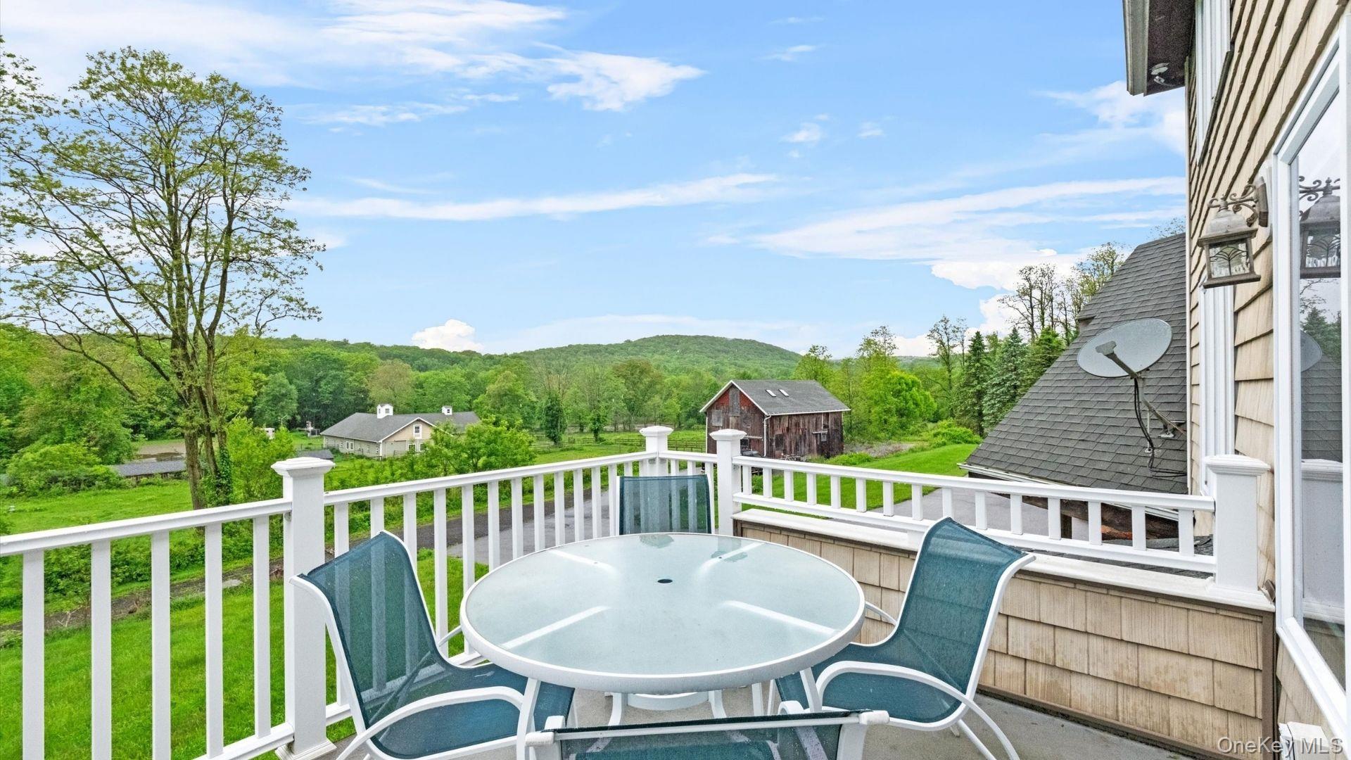 42 Blackstone Ridge Holmes, NY 12531 - Photo 34 of 43 a view of a chairs and table on the terrace