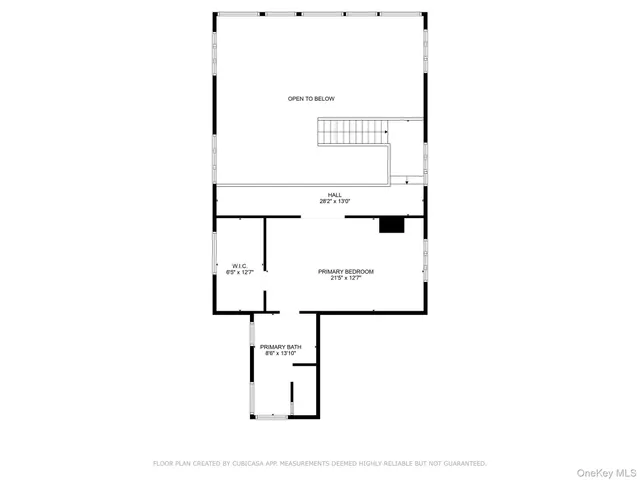 a picture of a bench in front of a wall