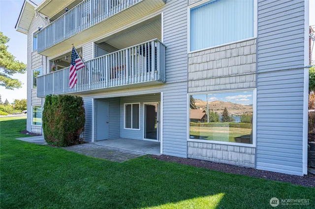 a view of a door and a window