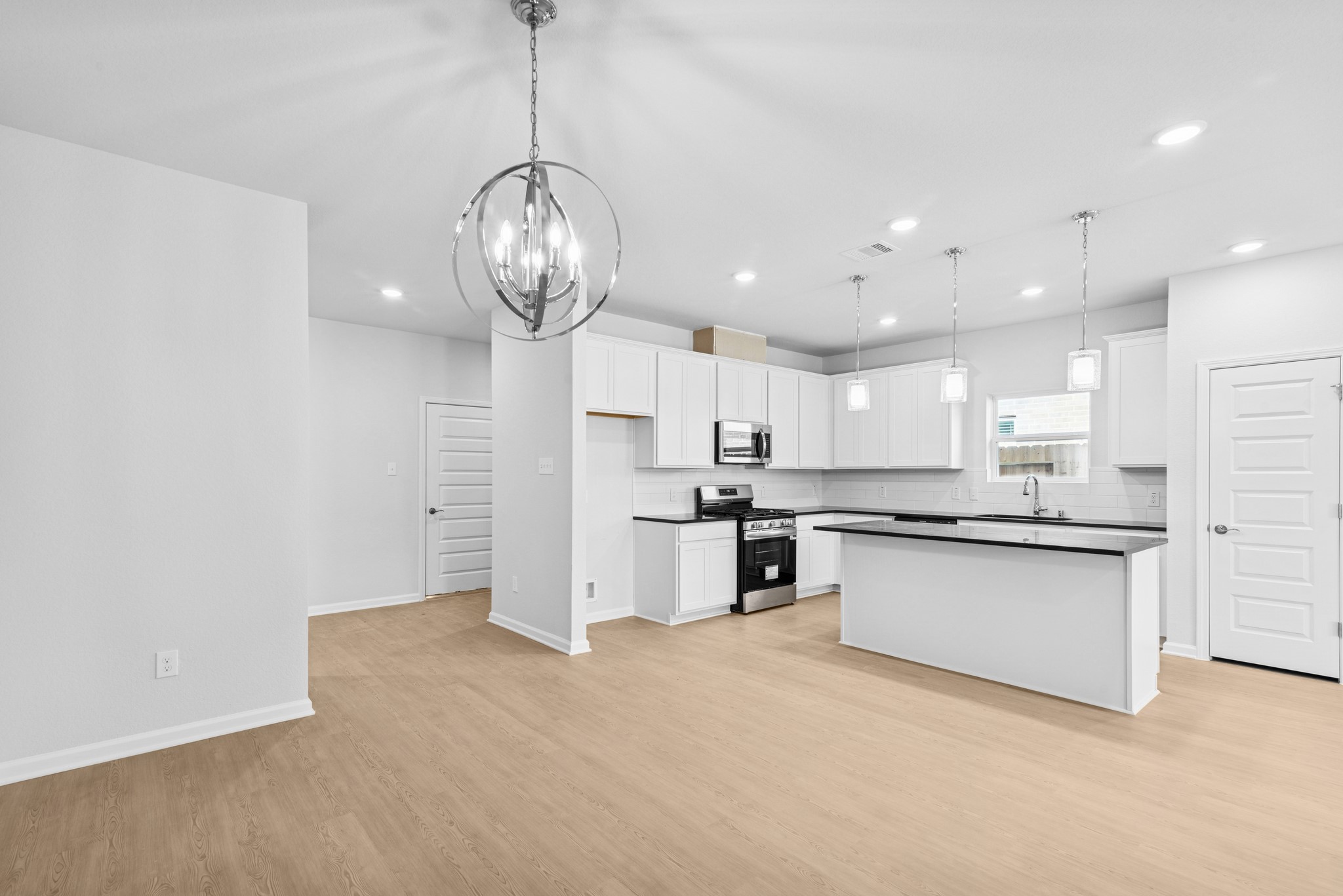 9742 Enclave Ridge Road Willis, TX 77318 - Photo 11 of 24 The Pearson- Dining Area into Kitchen