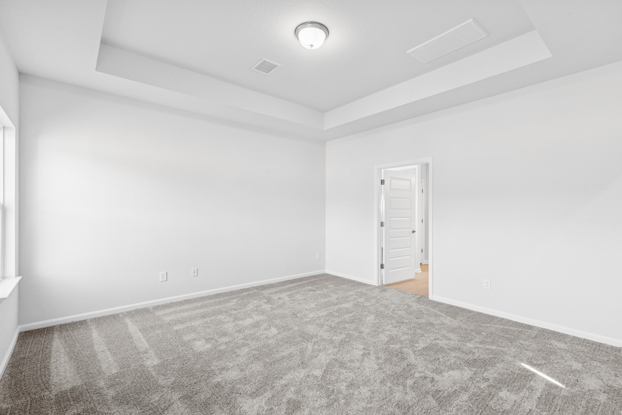 9742 Enclave Ridge Road Willis, TX 77318 - Photo 15 of 24 The Pearson- Primary Suite with Tray Ceiling