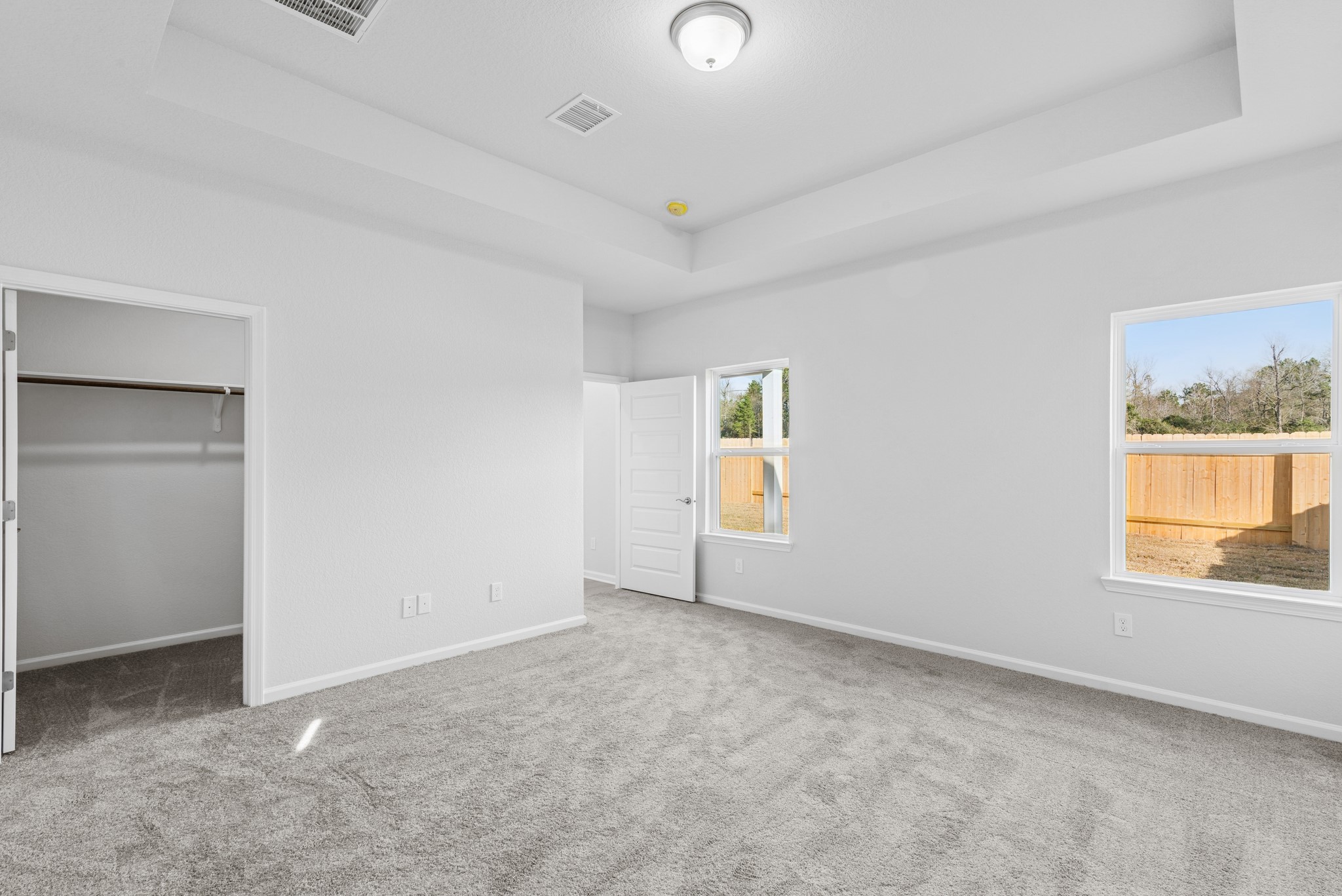 9742 Enclave Ridge Road Willis, TX 77318 - Photo 16 of 24 The Pearson- Primary Suite with Tray Ceiling