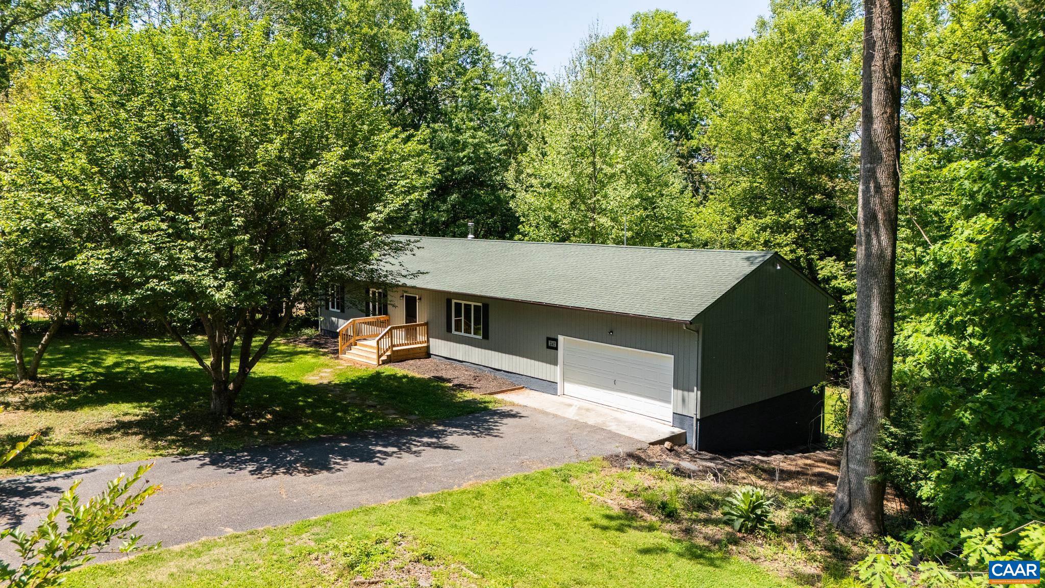 247 Goldenrod Road Ruckersville, VA 22968 - Photo 33 of 35 a view of a house with pool and yard