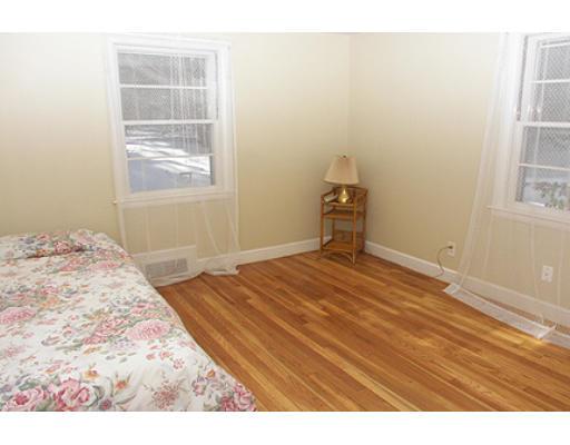 265 Hudson Road Sudbury, MA 01776 - Photo 8 of 10 a bedroom with a bed and a window