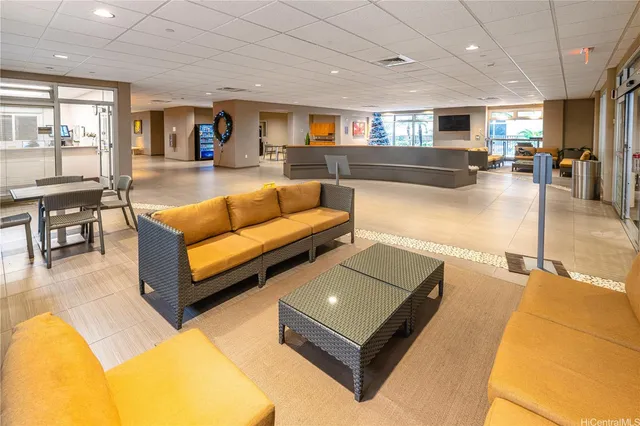 a living room with furniture and a table