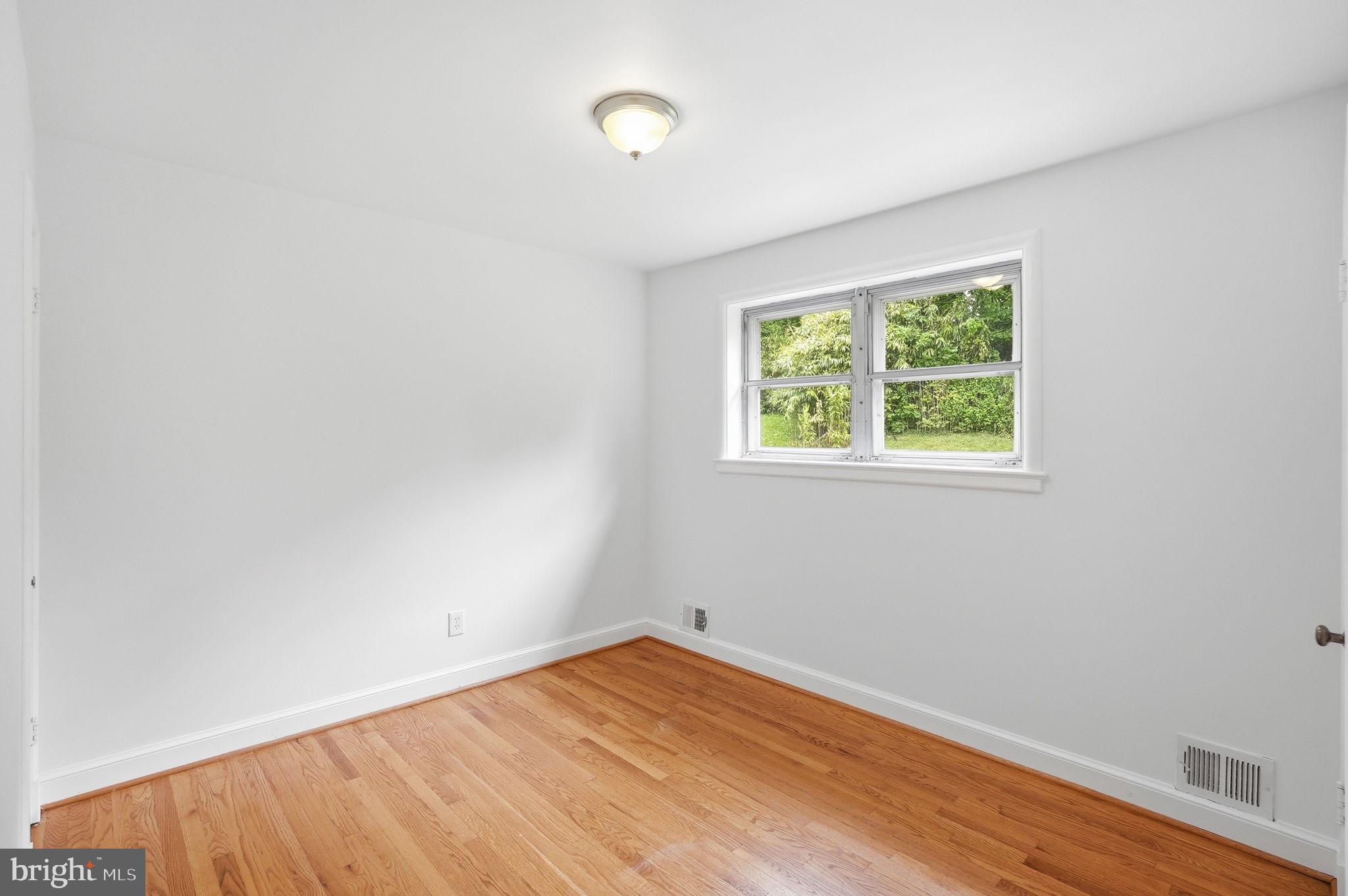 10207 Brunswick Avenue Silver Spring, MD 20902 - Photo 19 of 34 Third Bedroom