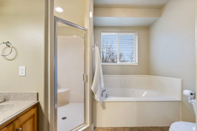 557 South 1470th Street East Springville, UT 84663 - Photo 16 of 46 Primary bathroom with a stall shower, vanity, and a bath
