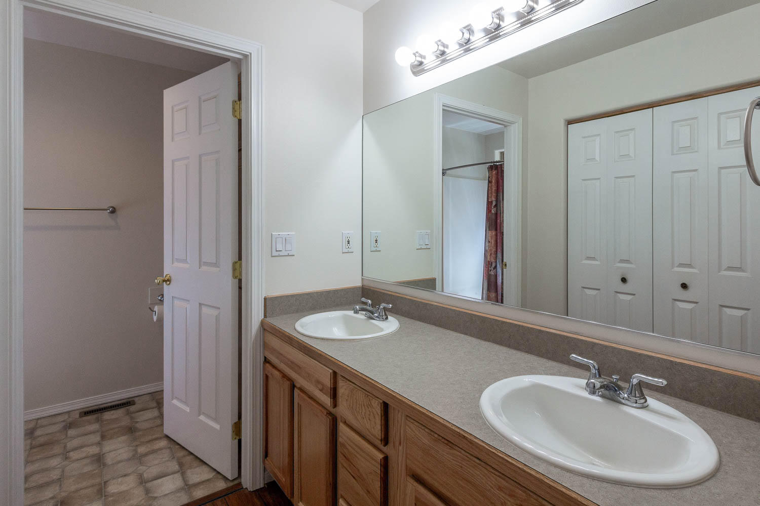 17151 Merced Road Bend, OR 97707 - Photo 13 of 30 a bathroom with a sink and a mirror