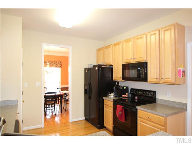 5105 Long Neck Court Raleigh, NC 27604 - Photo 3 of 22 Large with custom maple cabinets, hardwood floors and eating bar