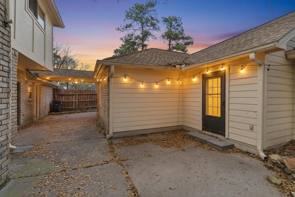 18326 Lake Oaks Drive Spring, TX 77388 - Photo 27 of 37 Backyard virtually staged with lights on