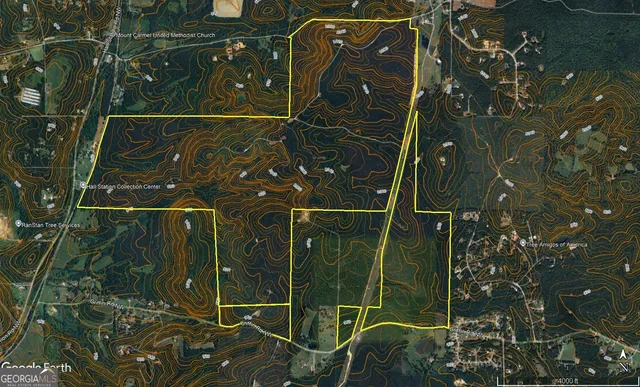 a backyard of a house with lots of swings