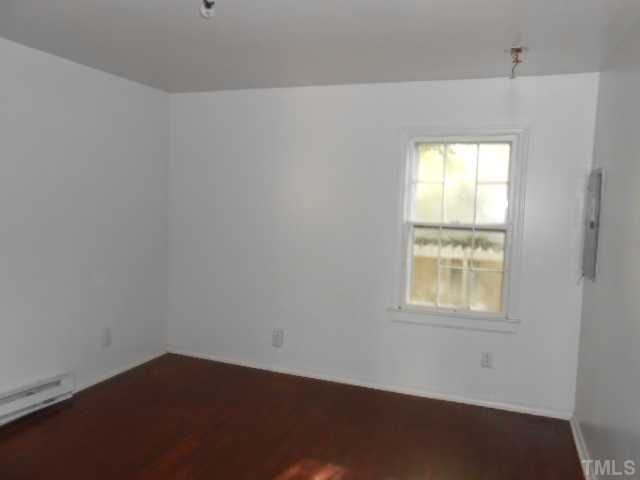 520 Steel Street Raleigh, NC 27603 - Photo 6 of 9 an empty room with a window