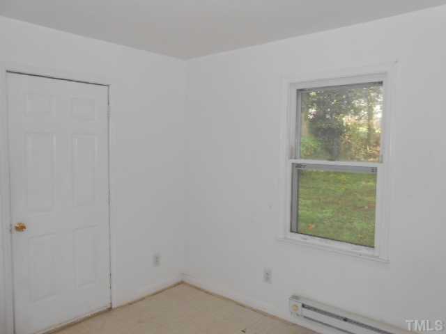 520 Steel Street Raleigh, NC 27603 - Photo 9 of 9 a view of an empty room with a window
