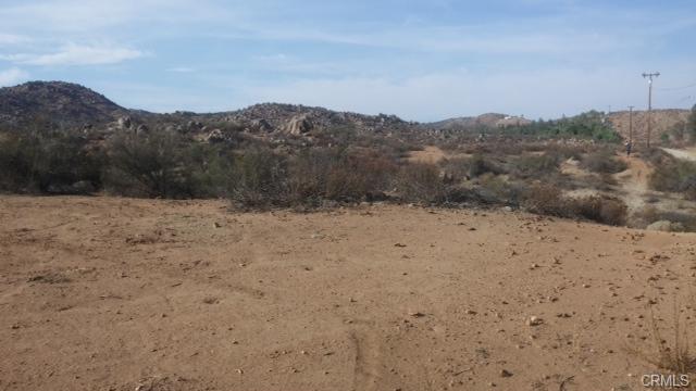10 On Post Road Perris, CA 92570 - Photo 6 of 10 a view of a dry yard covered with snow
