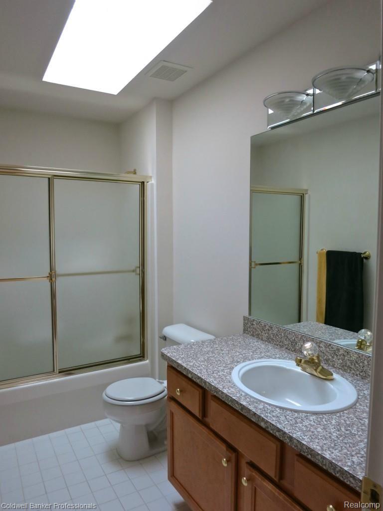 41699 Glade Road, Unit 35 Canton, MI 48187 - Photo 30 of 35 Main Bath with skylight