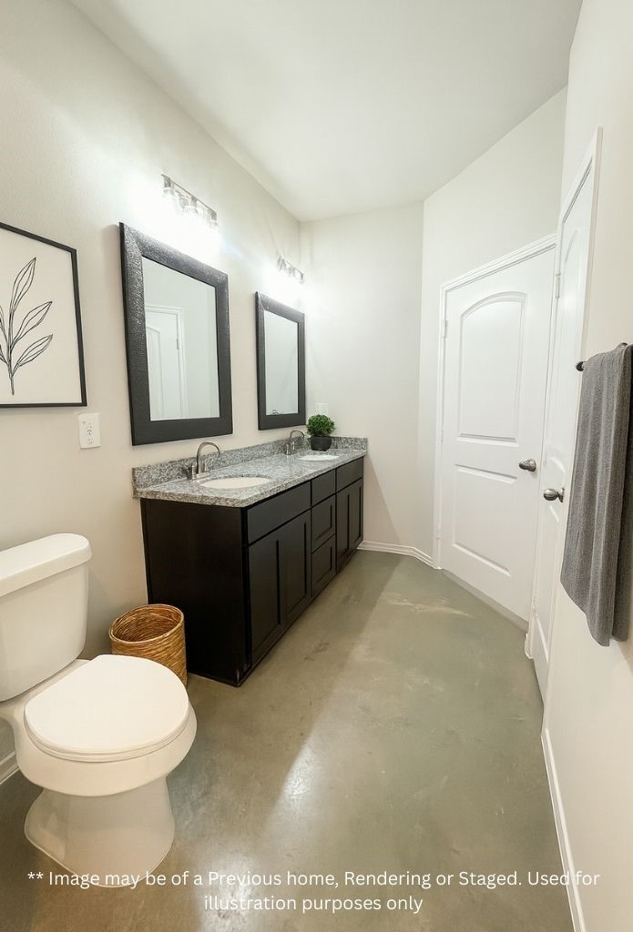 8 Greenway Drive Trinity, TX 75862 - Photo 8 of 13 a bathroom with a granite countertop toilet sink and mirror