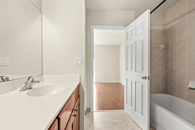 a bathroom with a sink and a bathtub