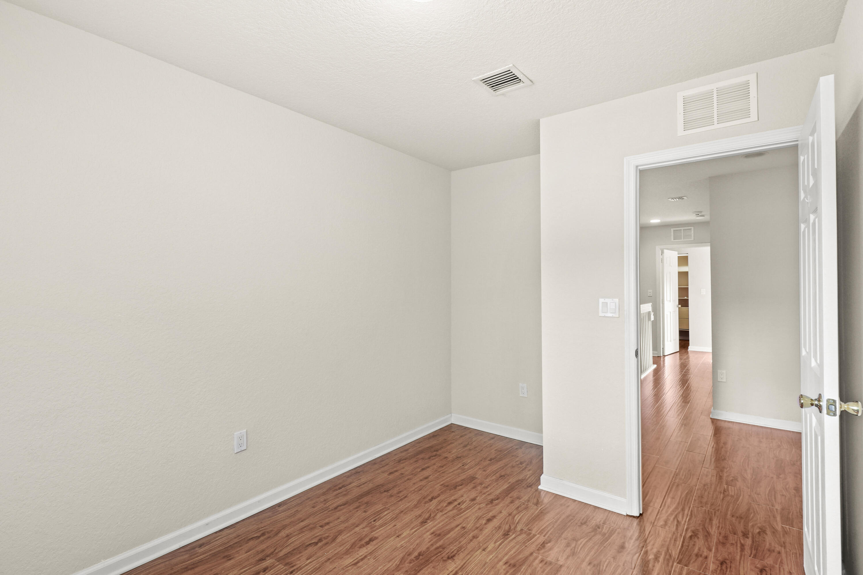 37 Southeast 3rd Avenue Hallandale Beach, FL 33009 - Photo 37 of 47 a view of a hallway with wooden floor
