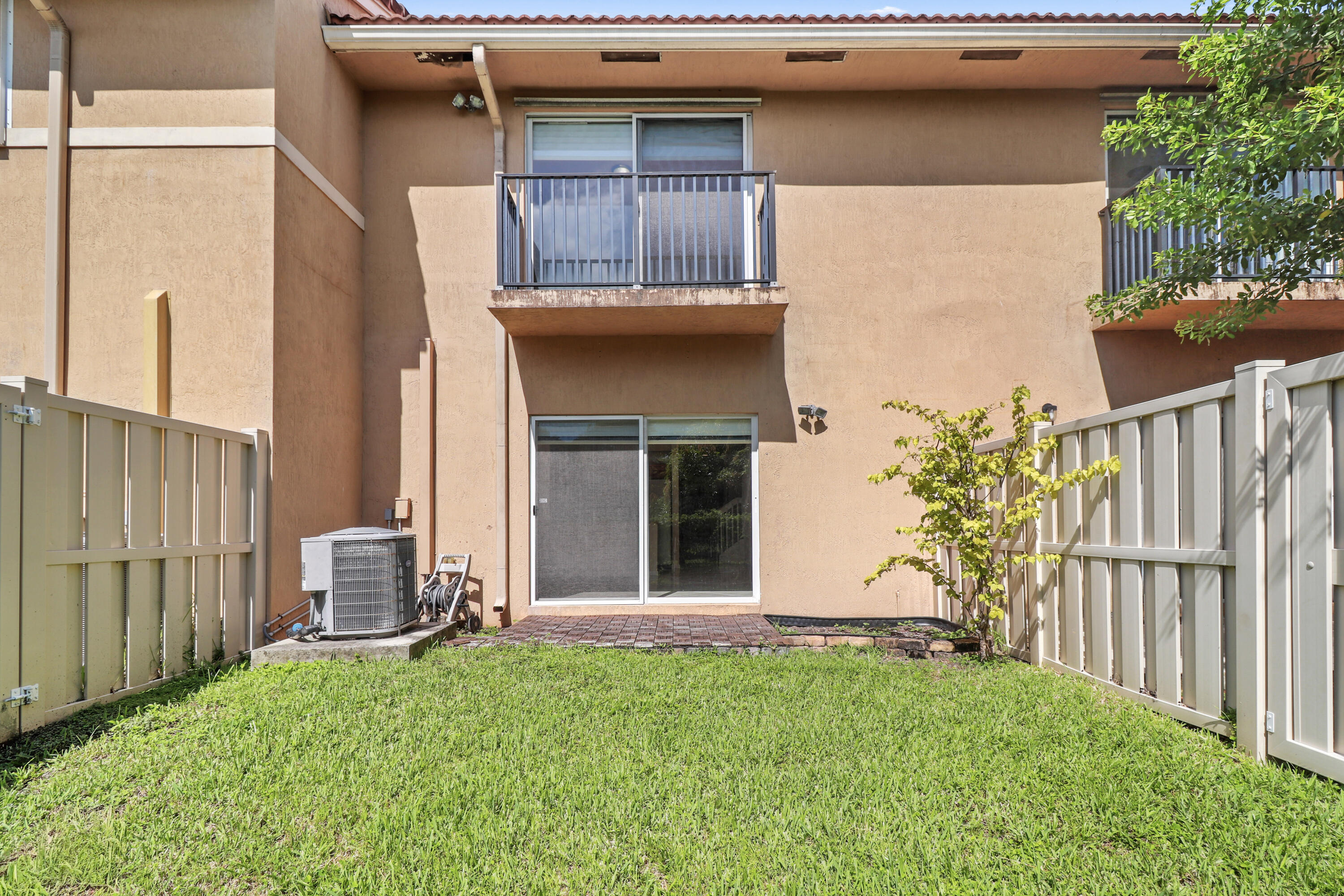 37 Southeast 3rd Avenue Hallandale Beach, FL 33009 - Photo 41 of 47 a view of a backyard of the house