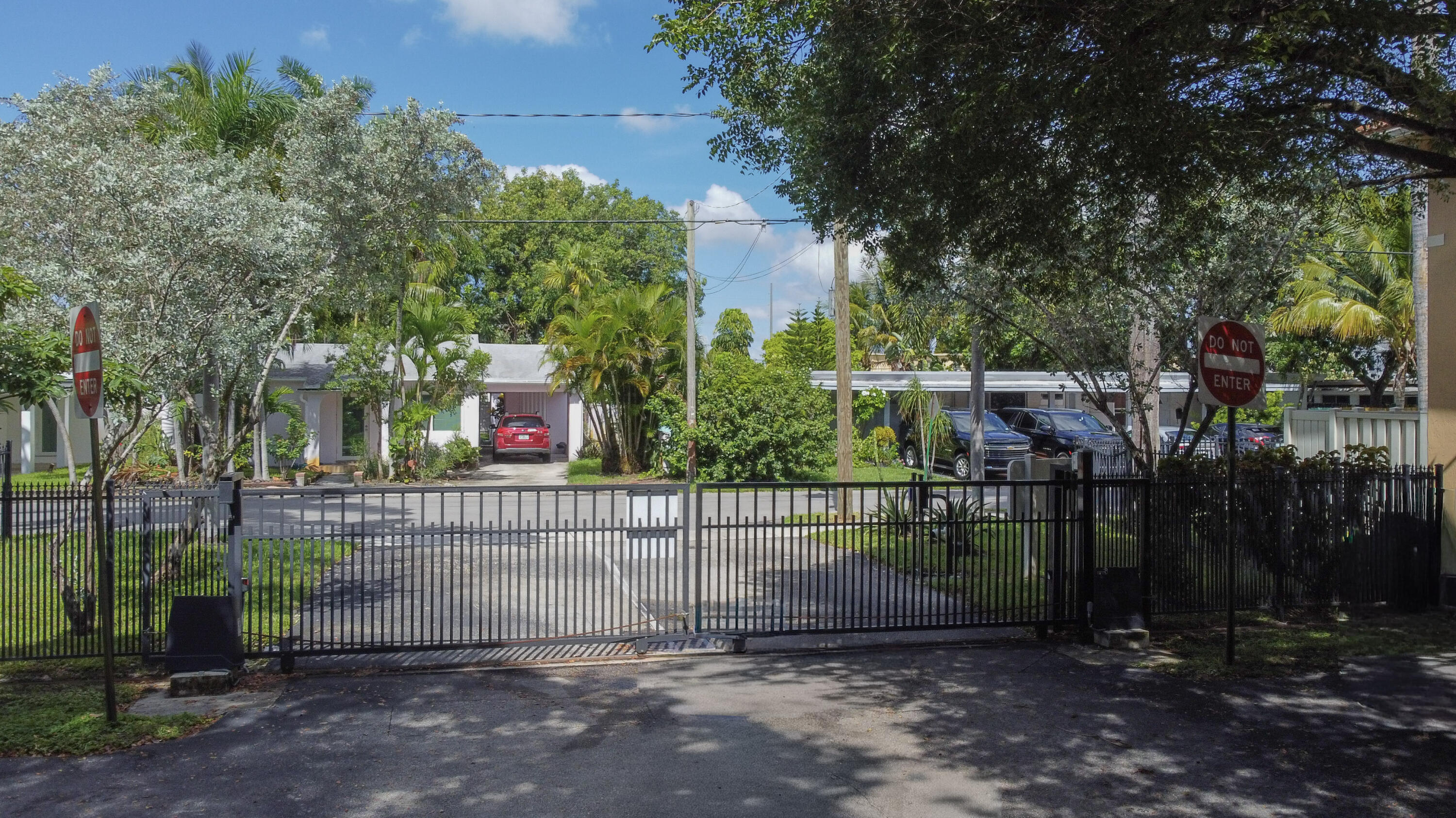 37 Southeast 3rd Avenue Hallandale Beach, FL 33009 - Photo 45 of 47 a view of street along with trees