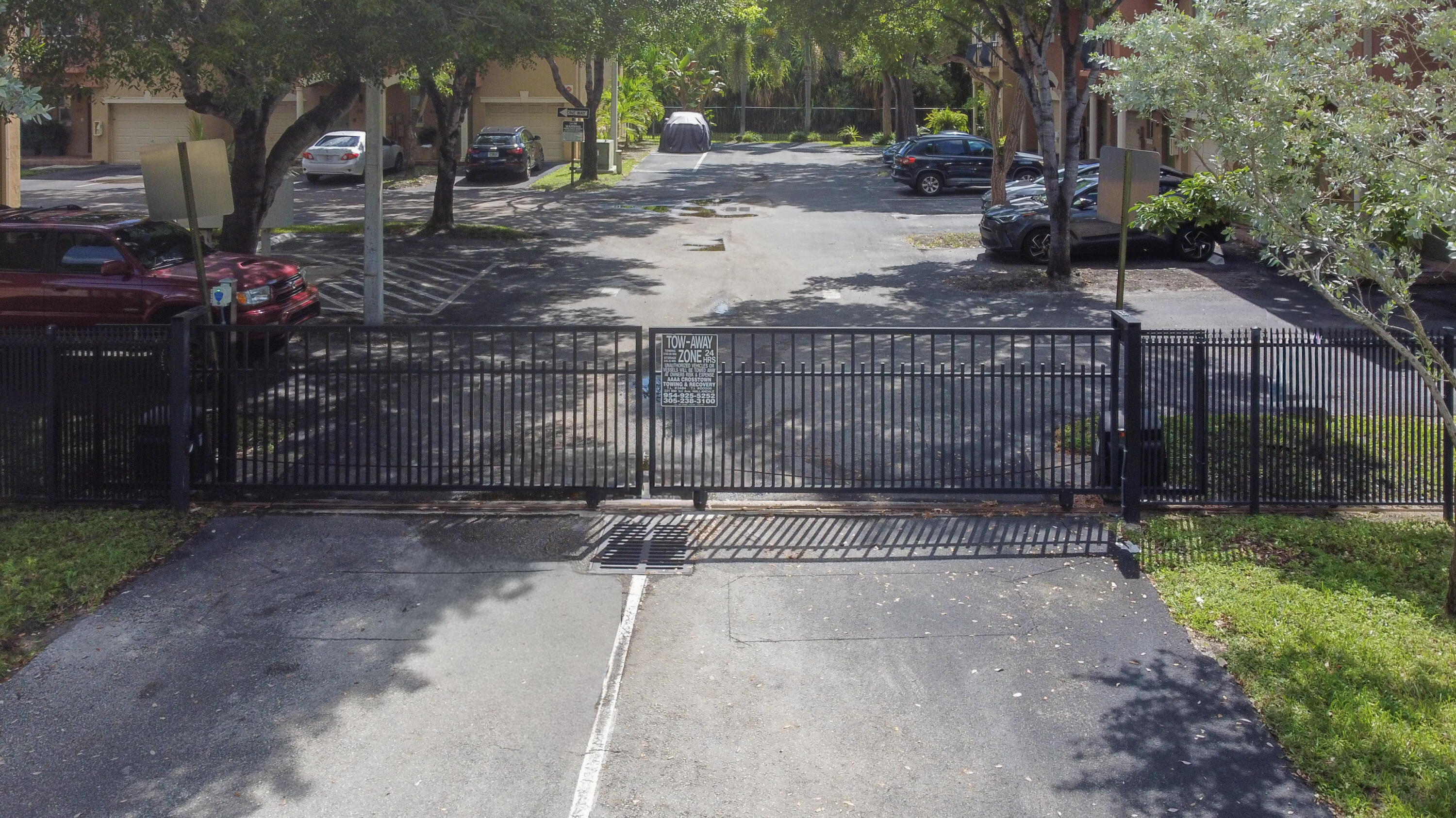 37 Southeast 3rd Avenue Hallandale Beach, FL 33009 - Photo 46 of 47 a view of a street with a small yard and large trees
