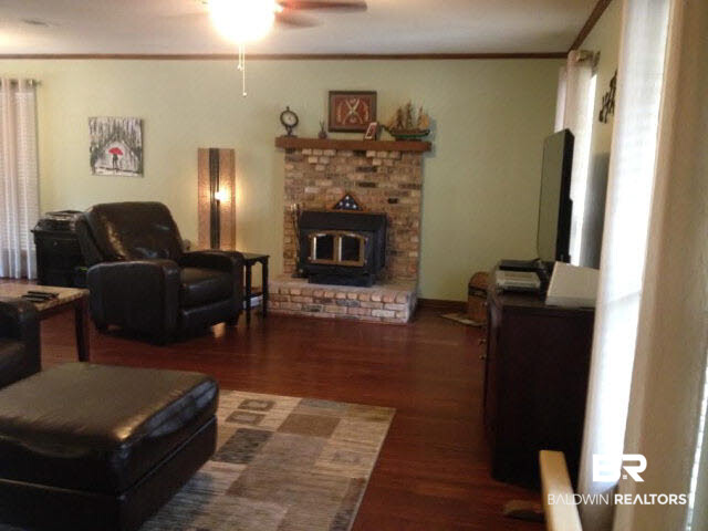 111 Woodside Drive Daphne, AL 36526 - Photo 3 of 31 Additional greatroom with a cozy woodburning fireplace