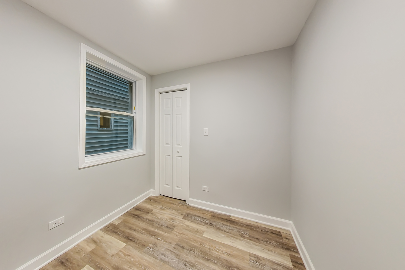 2338 West 18th Place Chicago, IL 60608 - Photo 13 of 63 a view of an empty room with a window