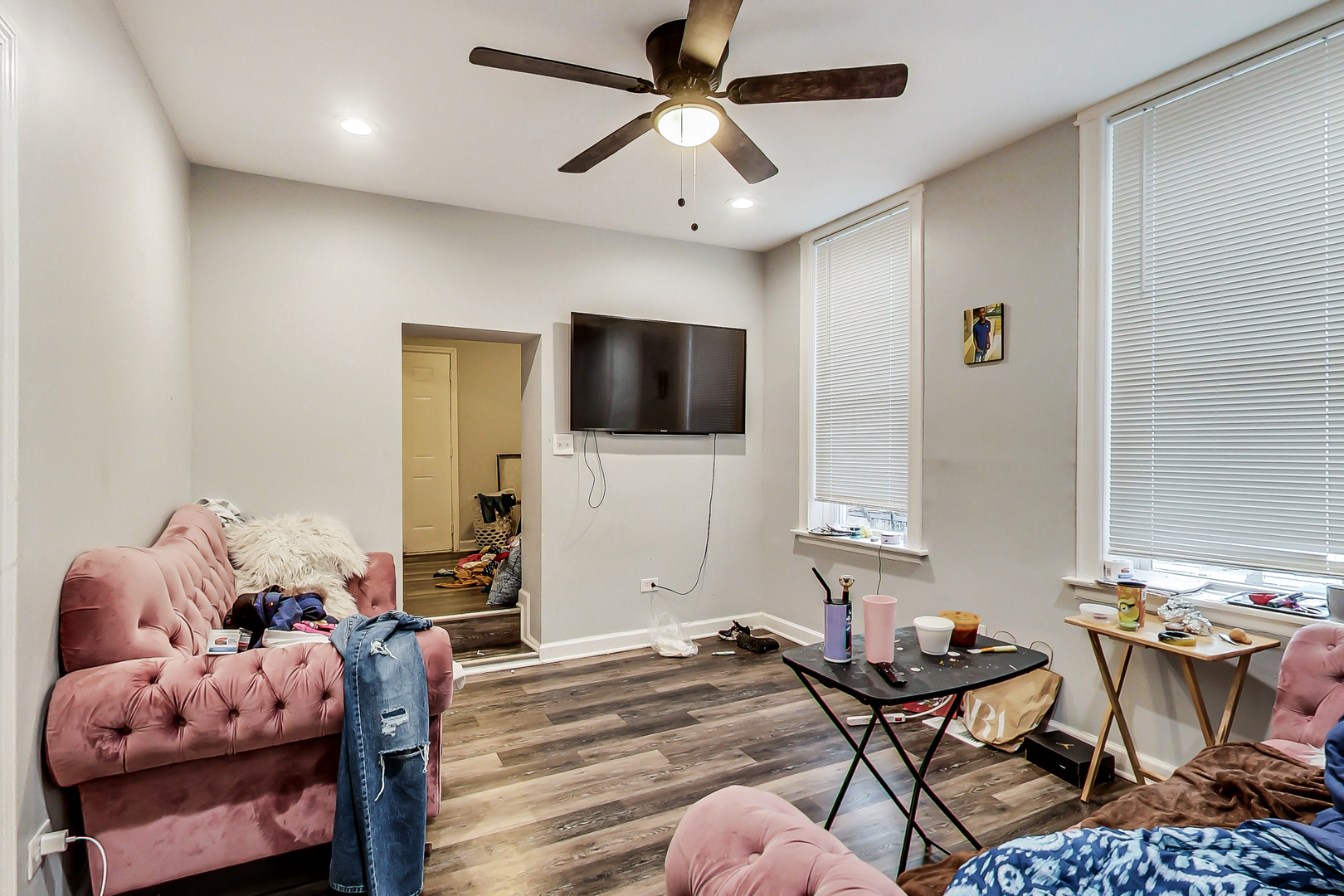 2338 West 18th Place Chicago, IL 60608 - Photo 17 of 63 a living room with furniture and a flat screen tv