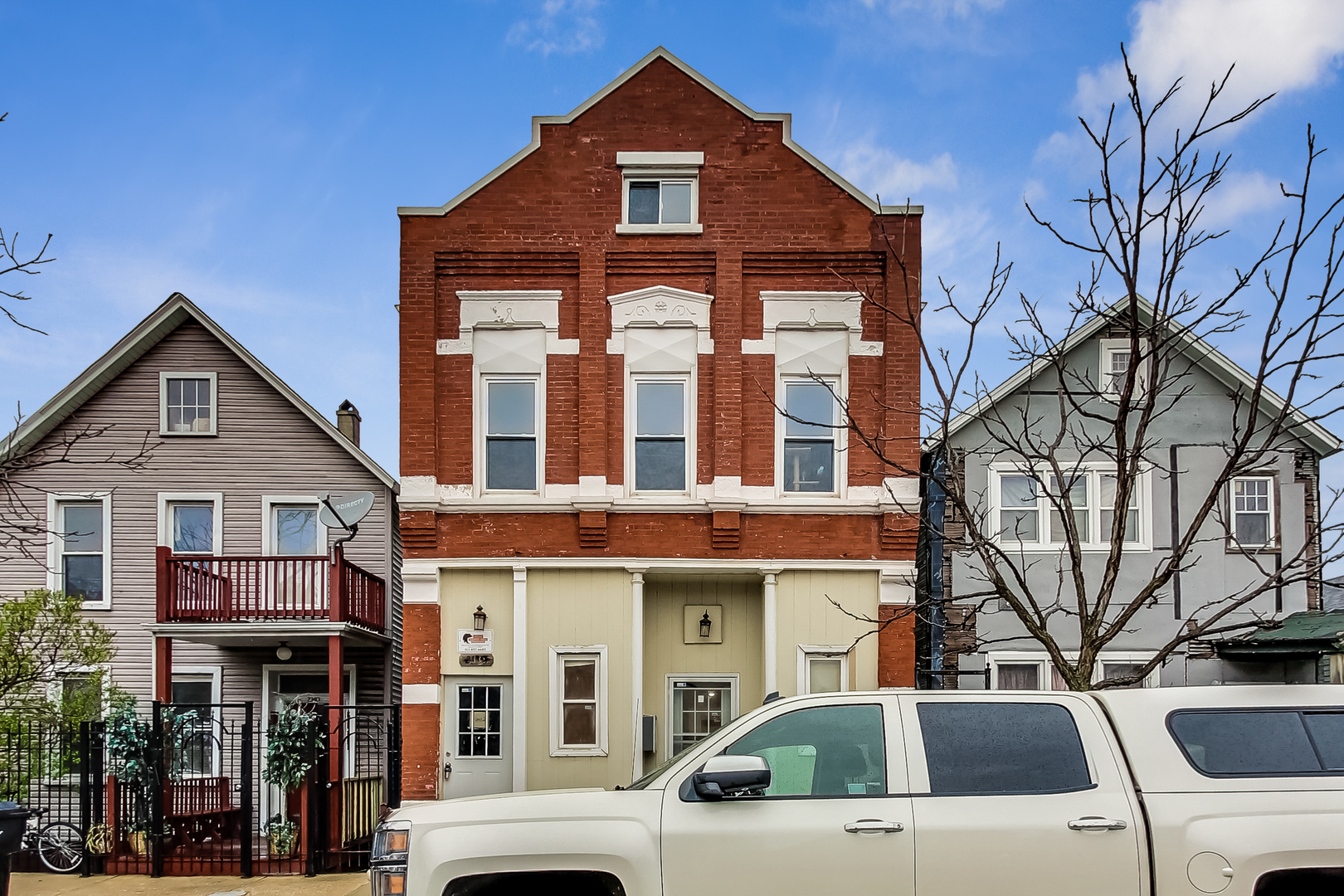 2338 West 18th Place Chicago, IL 60608 - Photo 2 of 63 a view of multiple houses with a yard