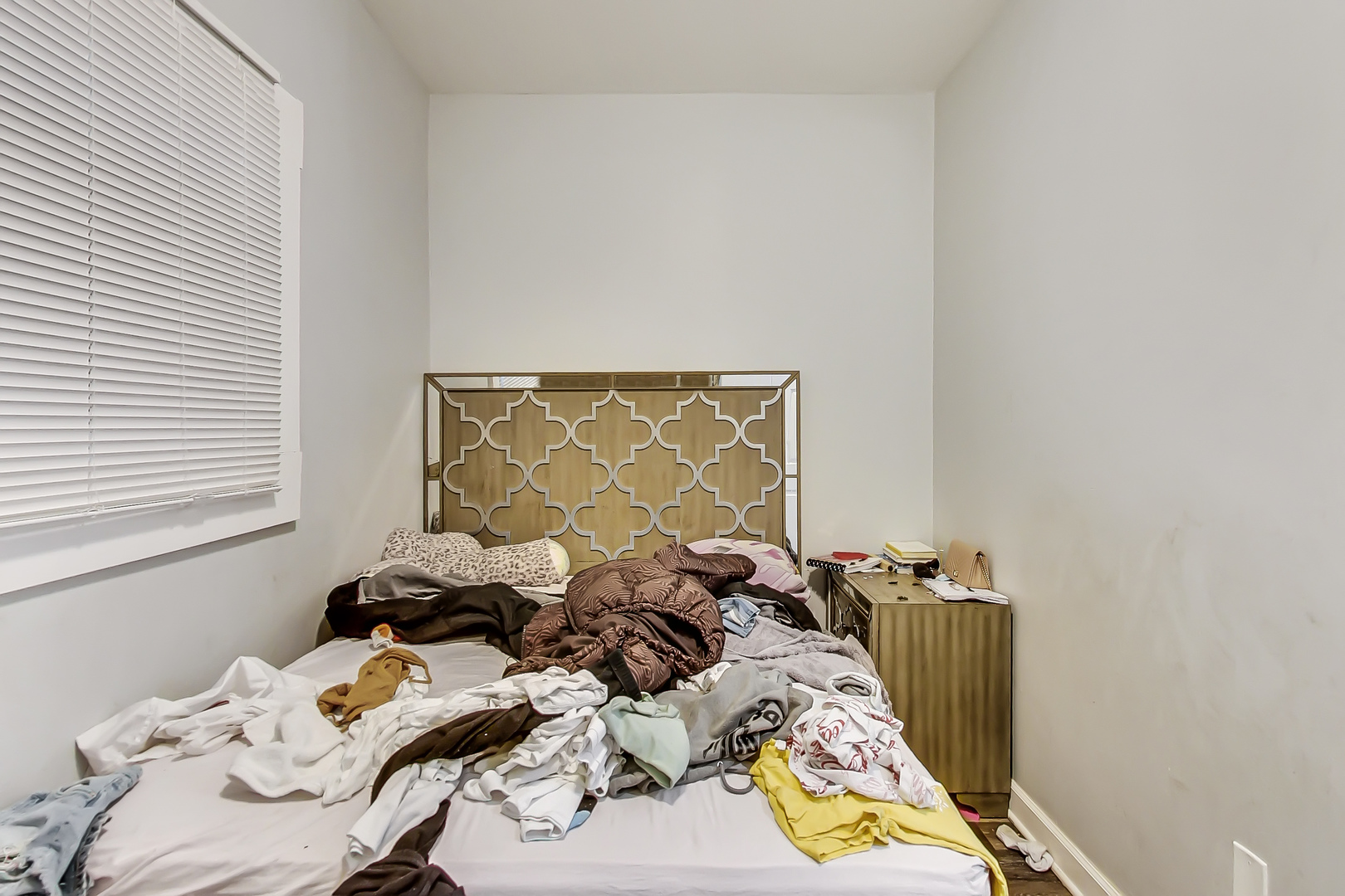 2338 West 18th Place Chicago, IL 60608 - Photo 25 of 63 a bed with a bed and a window