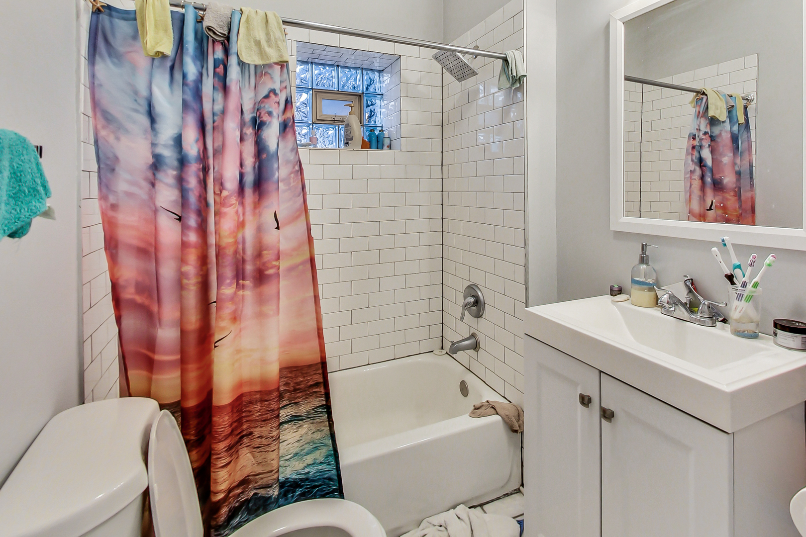 2338 West 18th Place Chicago, IL 60608 - Photo 32 of 63 a bathroom with a sink toilet and shower