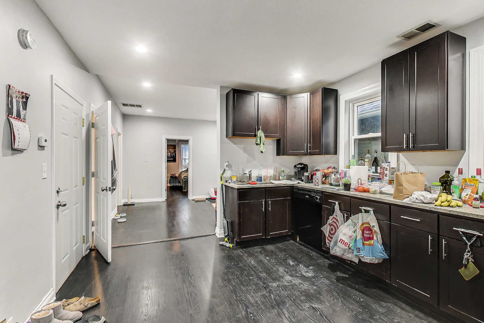 2338 West 18th Place Chicago, IL 60608 - Photo 41 of 63 a kitchen with stainless steel appliances granite countertop a refrigerator and a sink