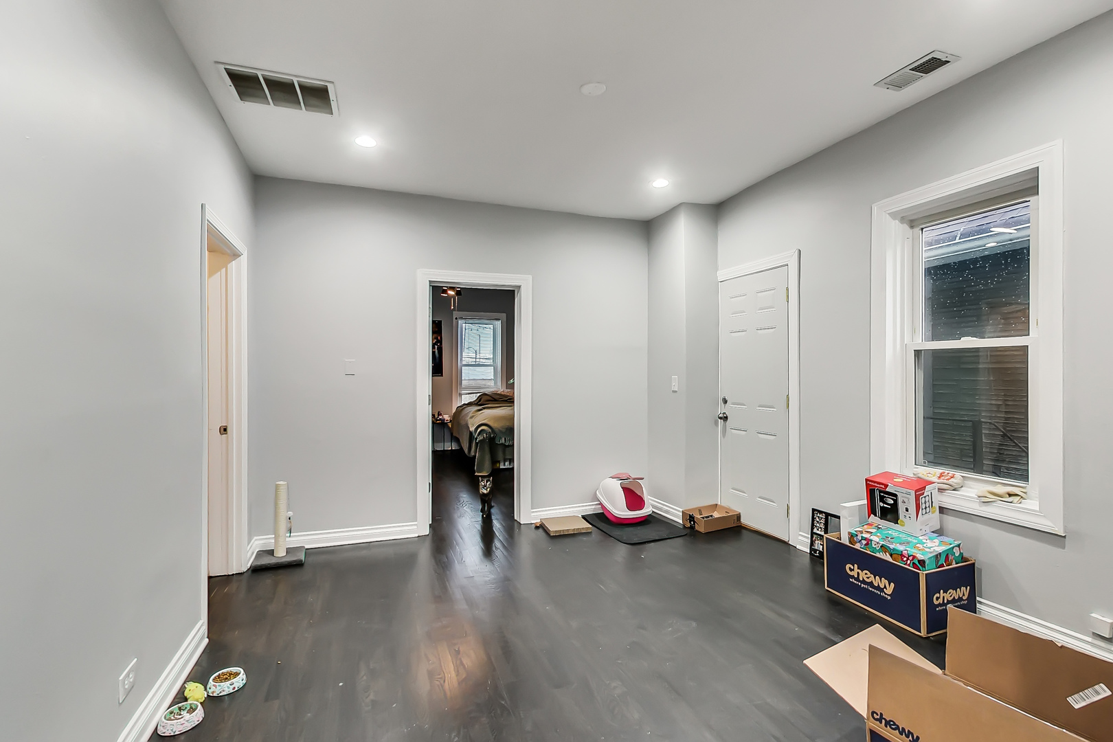 2338 West 18th Place Chicago, IL 60608 - Photo 42 of 63 a view of livingroom with furniture and wooden floor