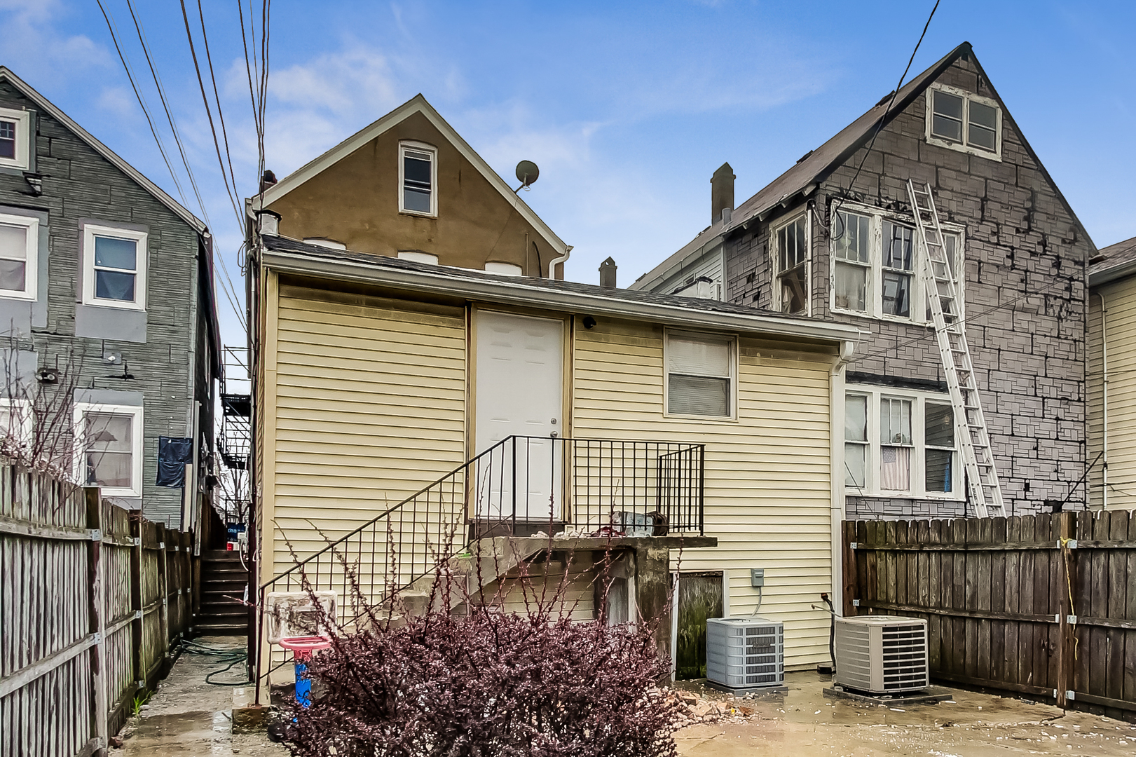 2338 West 18th Place Chicago, IL 60608 - Photo 54 of 63 a front view of a house with garage