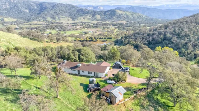 a view of a lake with a yard