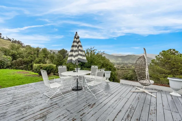 a view of a terrace with chairs
