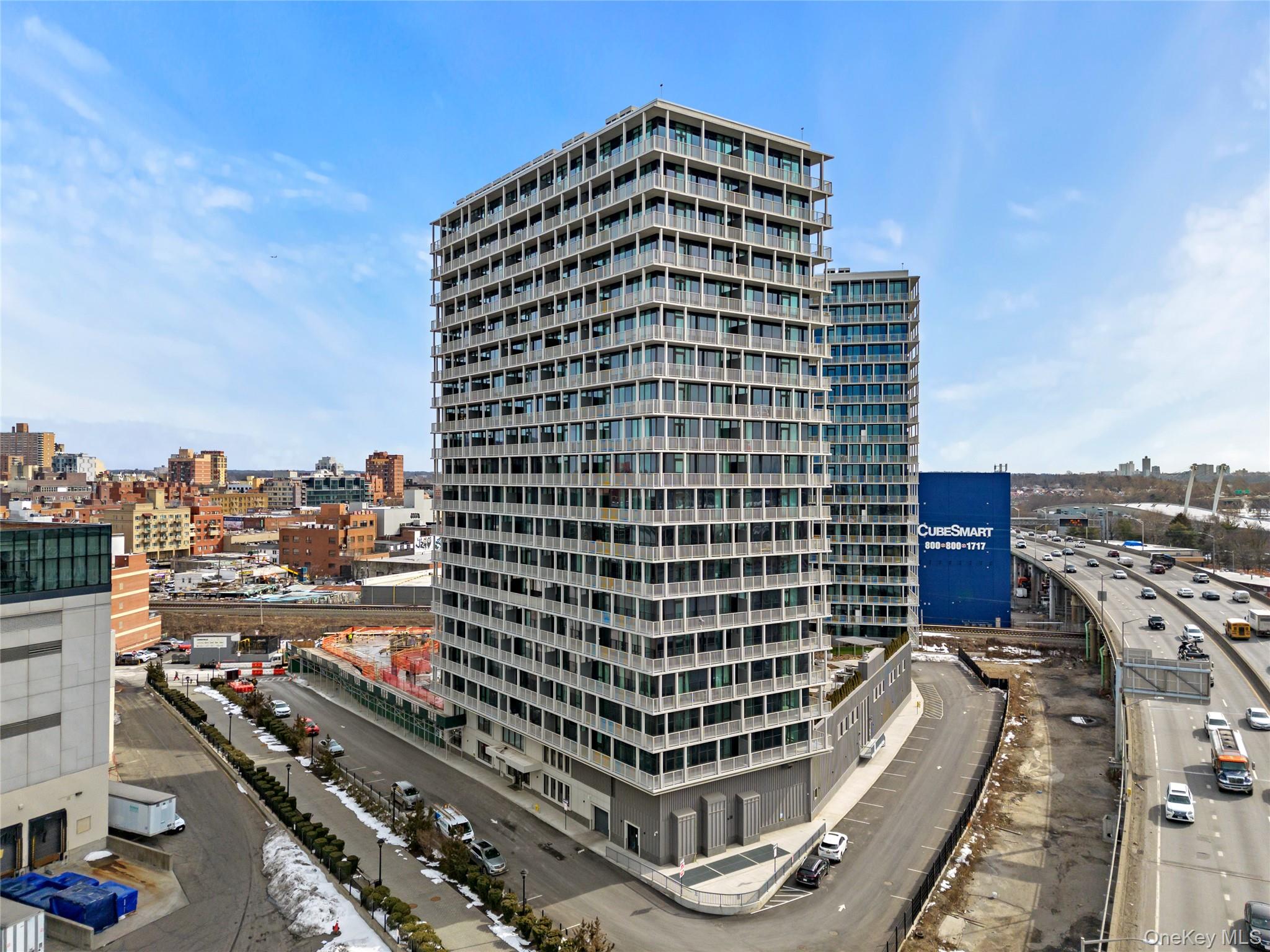 131-02 40th Road, Unit 9H Queens, NY 11354 - Photo 24 of 25 a view of a city with tall buildings