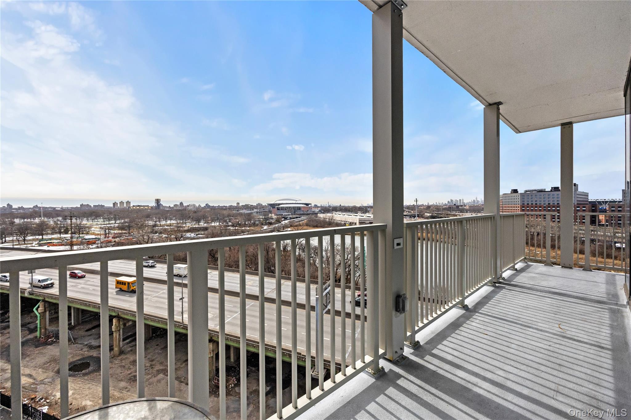 131-02 40th Road, Unit 9H Queens, NY 11354 - Photo 6 of 25 a view of a balcony with wooden floor