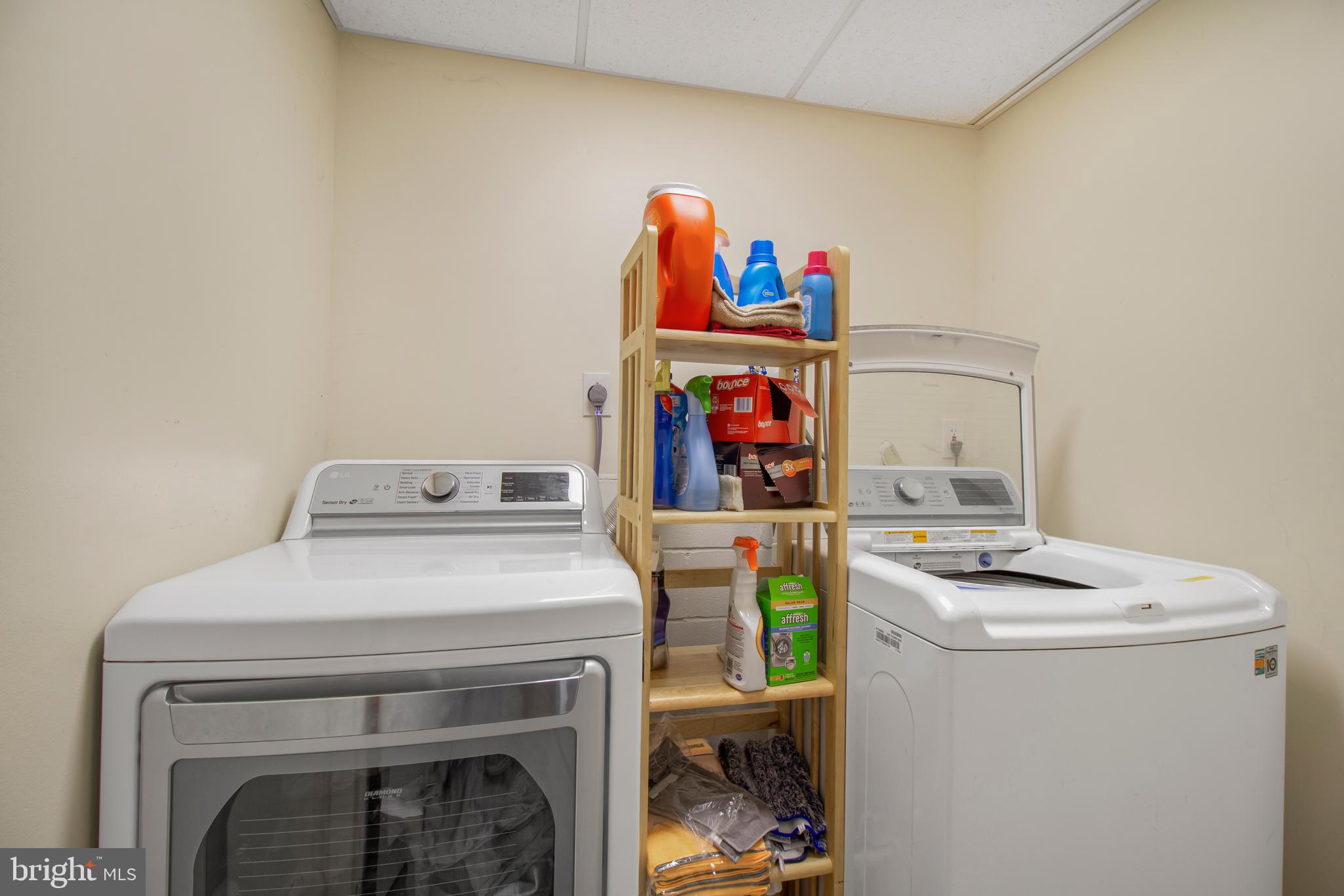 7009 Deepage Drive Columbia, MD 21045 - Photo 17 of 34 a utility room with dryer and washer