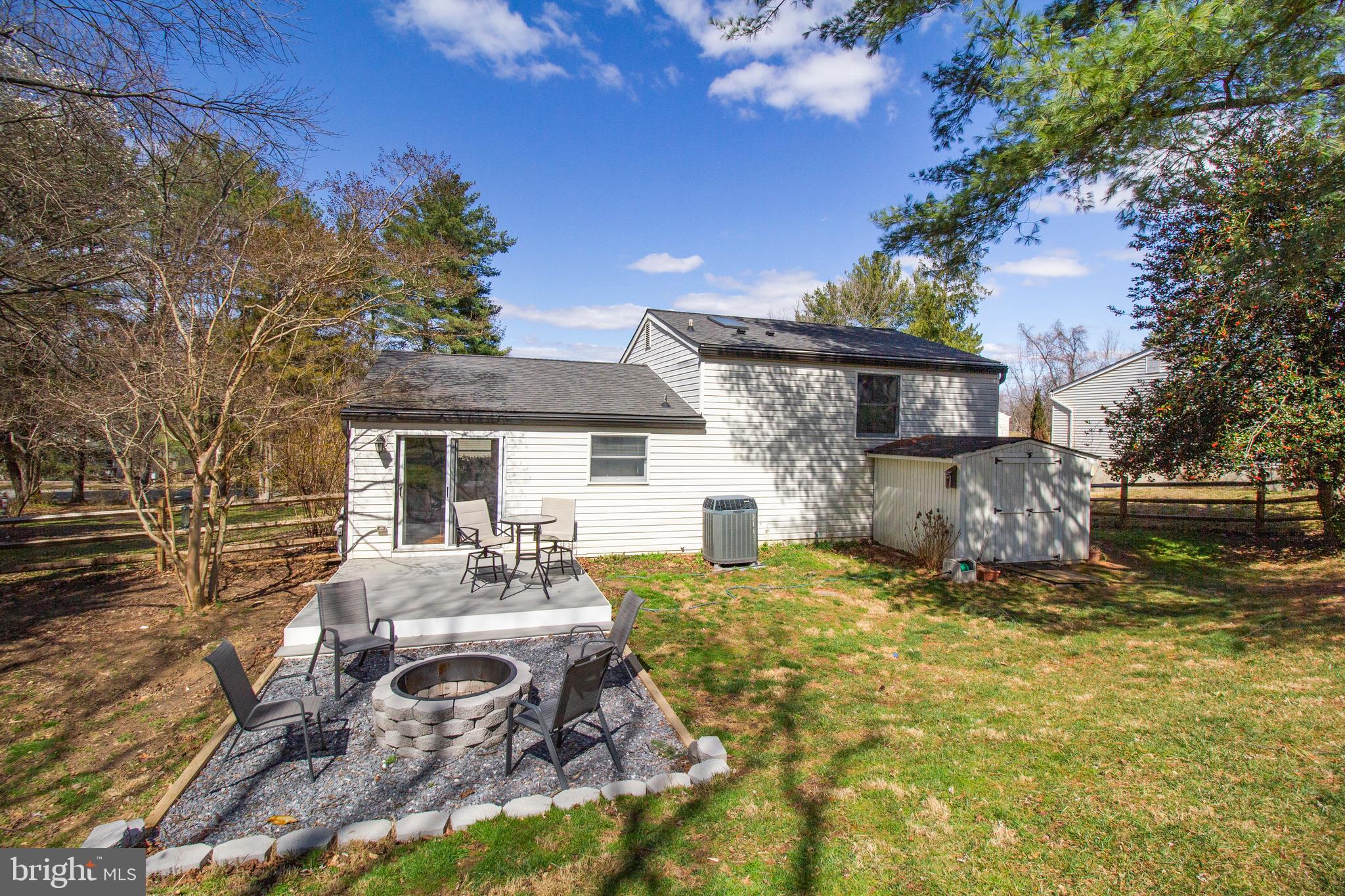 7009 Deepage Drive Columbia, MD 21045 - Photo 21 of 34 a front view of a house with garden