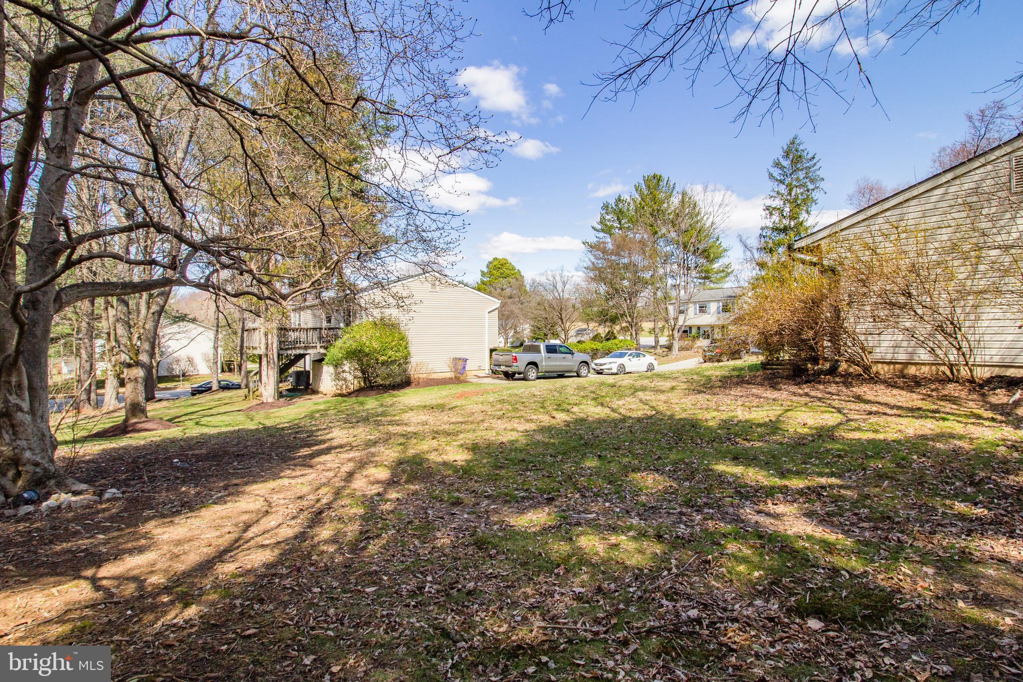 7009 Deepage Drive Columbia, MD 21045 - Photo 24 of 34 a view of road with large trees